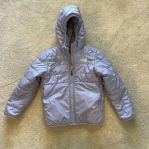 The North Face Girls reversible light purple puffer jacket